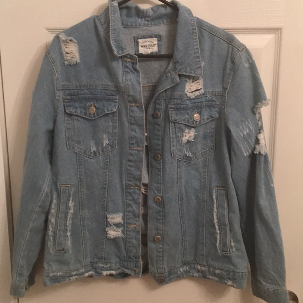 ripped blue denim jacket